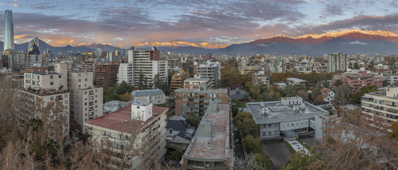 Amazing views of Santiago de Chile city during the sunset with the Andes mountain range making a wonderful horizon