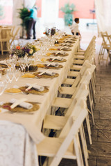 Retro empty vintage style wooden chairs for events and weddings