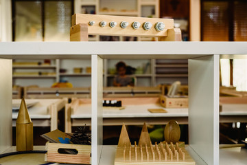 Toys and materials montessori in a classroom of a school for children