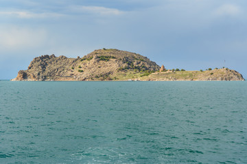 Fototapeta premium Akdamar Island with Armenian Cathedral Church of Holy Cross in Van Lake. Turkey
