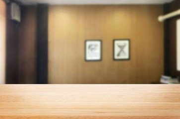 Wooden board empty table space platform in front of blurred Living Room Of The background - can be used for display or montage your products. Mock up for display of product