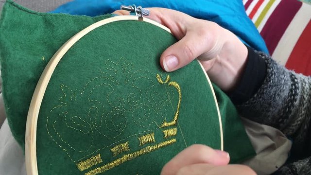 Woman embroidery at home Close-up details