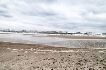 Sea and beach views from the sand dunes of the Curonian spit. Nida in Lithuania and Kaliningrad region in Russia