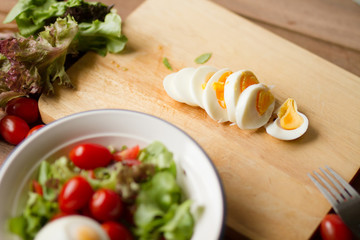 Healthy lunch of Salad with eggs at home. healthy eating, diet food, kitchen and cooking concept.