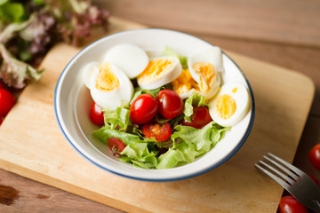 Healthy lunch with eggs salad at home. Healthy eating, vegetarian, diet food, kitchen and cooking concept.
