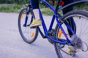 Young woman riding a bike