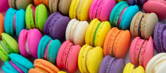 A french sweet delicacy, macaroons variety closeup.macaroon colourful texture.