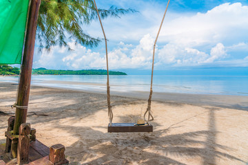 Beautiful Tropical Beach blue ocean background with Traveler items  vacation travel accessories for holiday or long weekend a guide  choice idea for planning travel