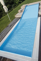 Obraz na płótnie Canvas Children's slide with mini pool.