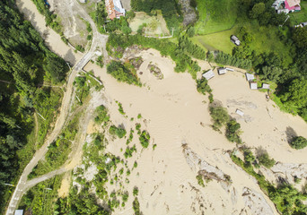 river flood into the lake. Poiana Teiului, Romania. aerial view