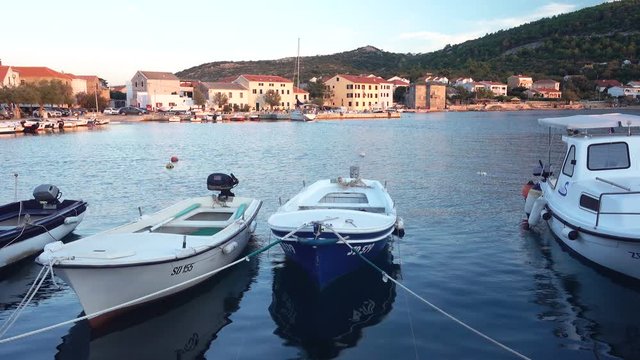 Small fishing village in Croatia, traditional fishing boats in harbor, Vinjerac near Zadar