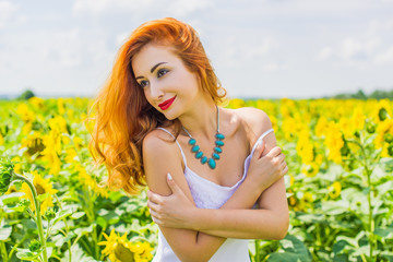 Naklejka na ściany i meble Nature, summer holidays, vacation and people concept - young redhead woman in white dress dreaming about good life and enjoy the moment 