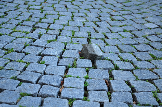 stumble stone in pavement
