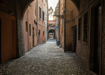 Fototapeta na wymiar Via delle Volte of Ferrara in the medieval quarter. Emilia-Romagna. Italy.
