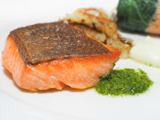 Delicious grilled salmon steak on white background. 