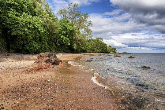The red sand of Rosemarkie beach near Inverness