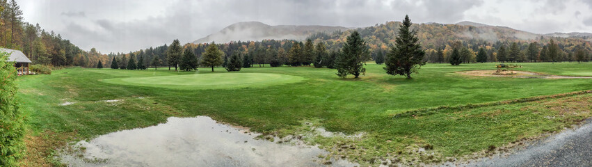 Fototapeta na wymiar Panoramic view of Foliage landscape on a rainy day, autumn season, panoramic view