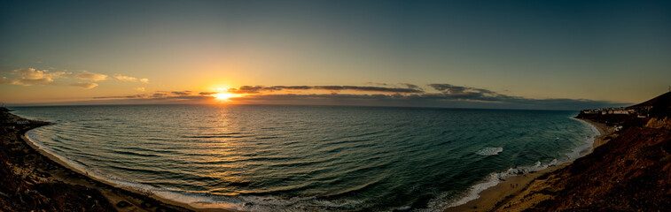 Panorama of Sunset at sea shore