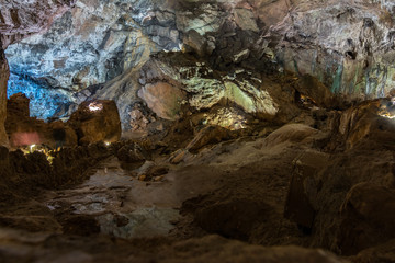 Cave of Valporquero. The Cave of Valporquero is located on the southern slope of the Cantabrian Mountains, north of the Province of León