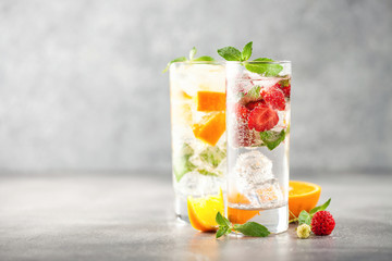 Summer drinks with strawberry and orange