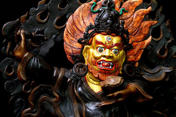 Sculpture of the Buddhist deity Mahakala © yanosh_nemesh