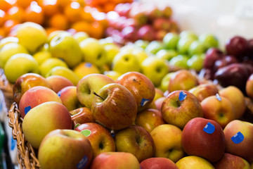 appetizing apples on counter in market