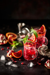 Red cocktail with blood orange and pomegranate.