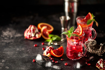 Red cocktail with blood orange and pomegranate.