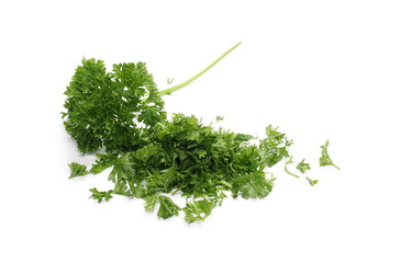 Fresh green chopped parsley leaves isolated on white background
