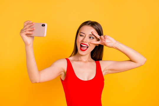 Modern technology people person good mood concept. Photo portrait of screaming with open mouth cool swag pretty lady taking making selfie isolated on bright vivid background