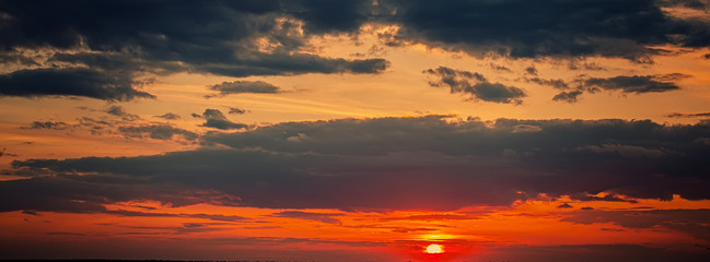 Summer rural landscape at sunset and clouds. Web banner.