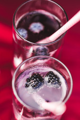 Various cold fresh drinks, berries lemonade closeup on wedding reception