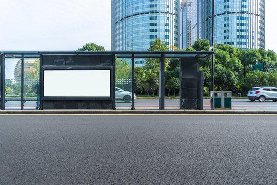 Blank billboard at bus stop in city of China.