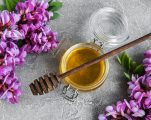 Obraz na płótnie Canvas Honey with acacia blossoms