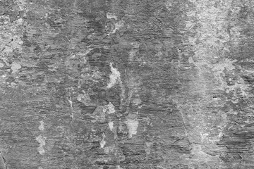 Wall fragment with scratches and cracks