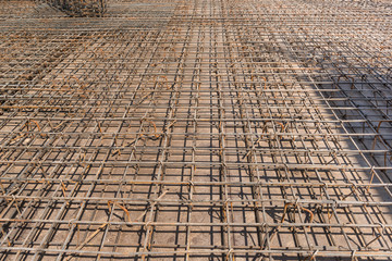 metal construction of rods for pouring concrete for foundation