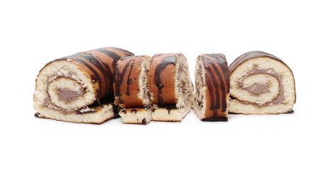 Chocolate roll slices with cocoa cream isolated on white background