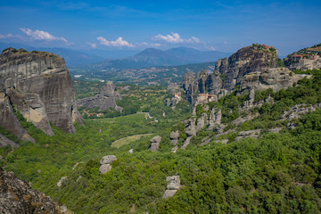 Obraz premium Meteora Beautiful Stone shapes and Mountains with Monastery on them in Greece