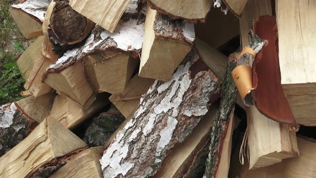 Wood made from birch (cut version). Pile of chopped fire wood prepared for winter. Birch firewood.
