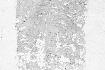 Wall fragment with scratches and cracks