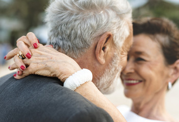 Mature couple getting married at the beach