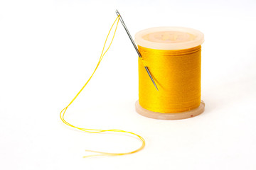 Coil of yellow thread.