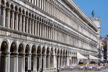 Fototapeta premium Arcades of the facade on Piazza San Marco in Venice, Italy