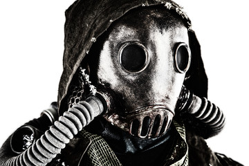 Close up portrait of nuclear post-apocalypse survivor, living underground mutant or creature, skilled stalker wearing rags and armored full-face gas mask or air breathing apparatus, toned shoot