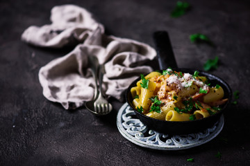 Skillet pastrami carbonara  .dark photo.