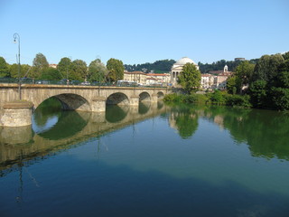 An amazing photography of the city of Turin from italy in summer days from the high and low part of the city including the beautiful river of Po from the center