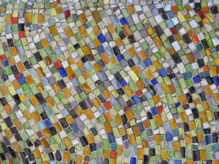 Multicolored mosaic on the wall. Abstract pattern