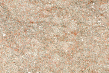 Pink-gray granite surface. Solid background