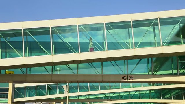 Airport Terminal Glass Tunnel to the Aircraft