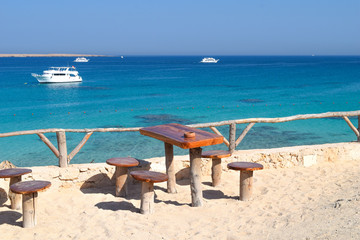 idyllic view of Mahmya island with turquoise water, in front of bench, Egypt